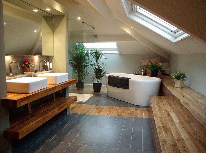 Dashing-bathroom-with-slanted-ceiling-and-skylight